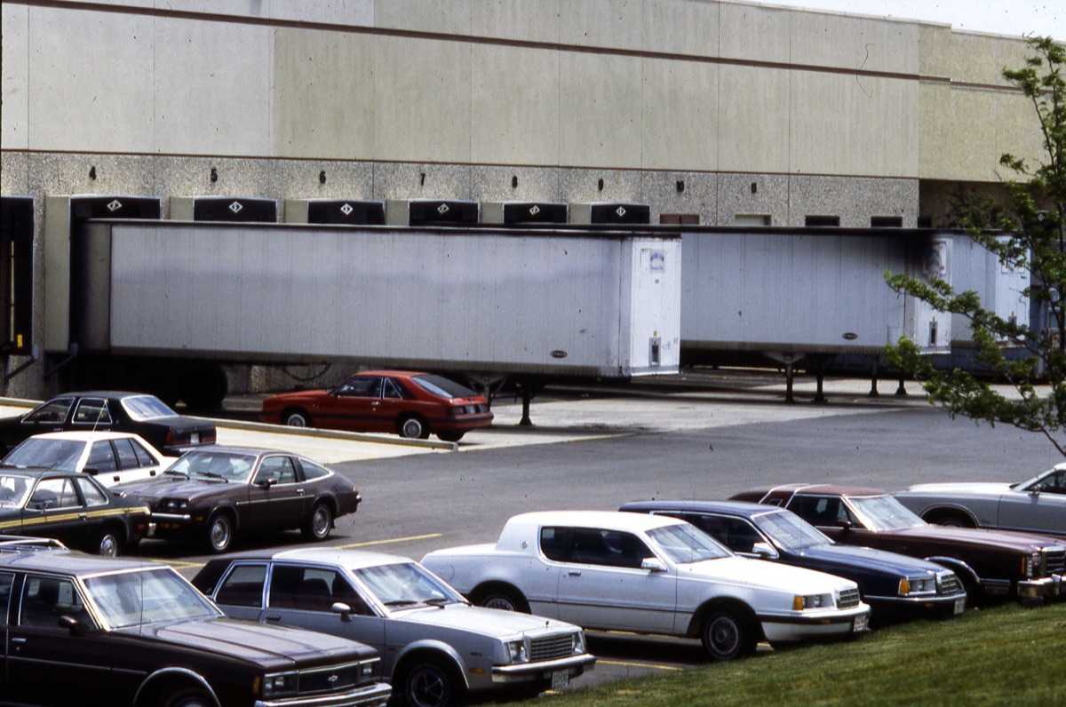 A warehouse loading bay with trailers at the dock